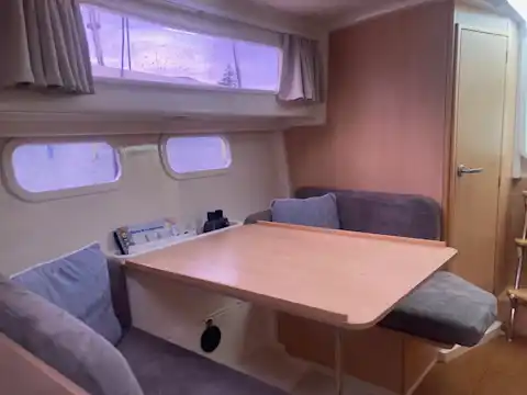 Cozy wooden-look bunk on the Lilly houseboat