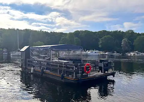Party raft Locken Dieter on a boat tour with guests in Berlin Spandau