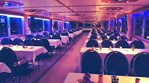 Salon with tables and chairs on the ship "Wappen von Spandau"