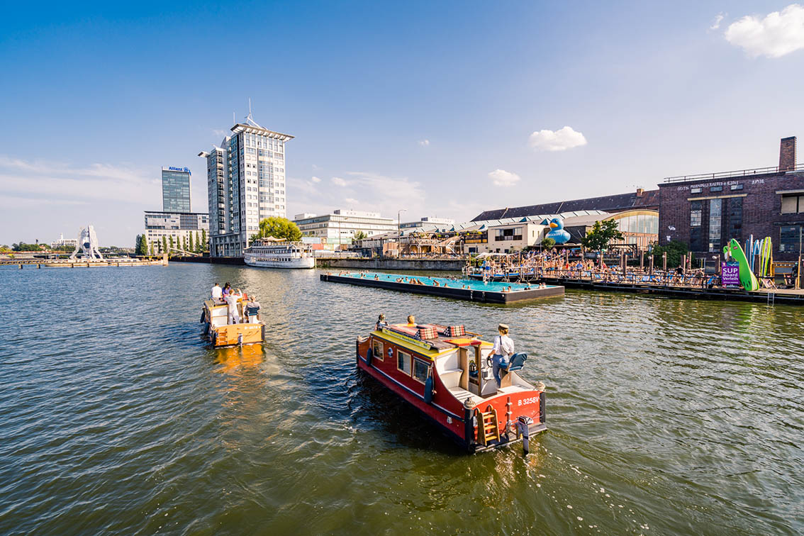houseboat Watercoach rental Berlin The water carriages from Berlin Bootsverleih in front of the Badeschiff in Treptow
