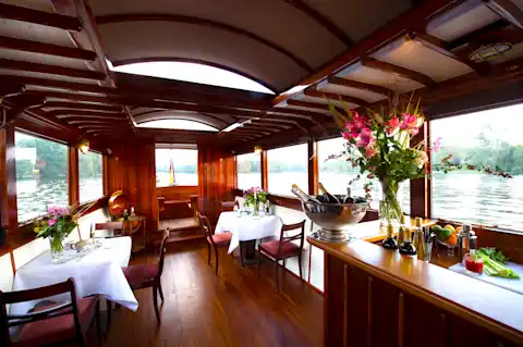 Elegant tropical wood salon on the Sir Peter party boat